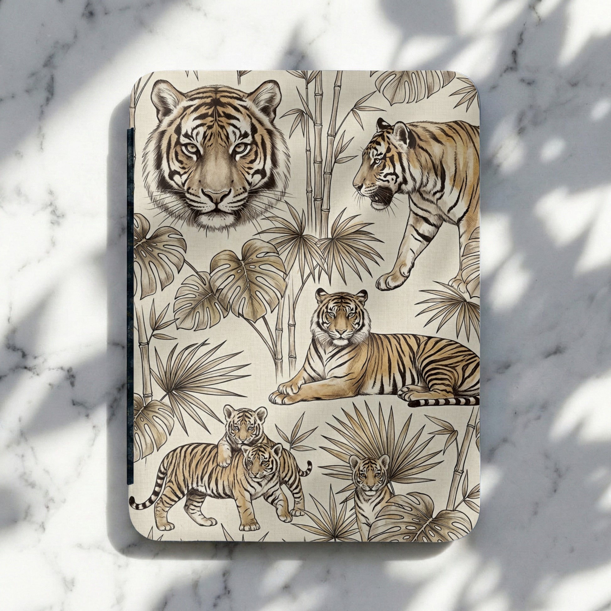 Tiger and foliage pattern on a cream background with a marble surface.