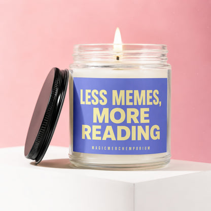 Lit candle in jar with blue label reading "LESS MEMES, MORE READING"
