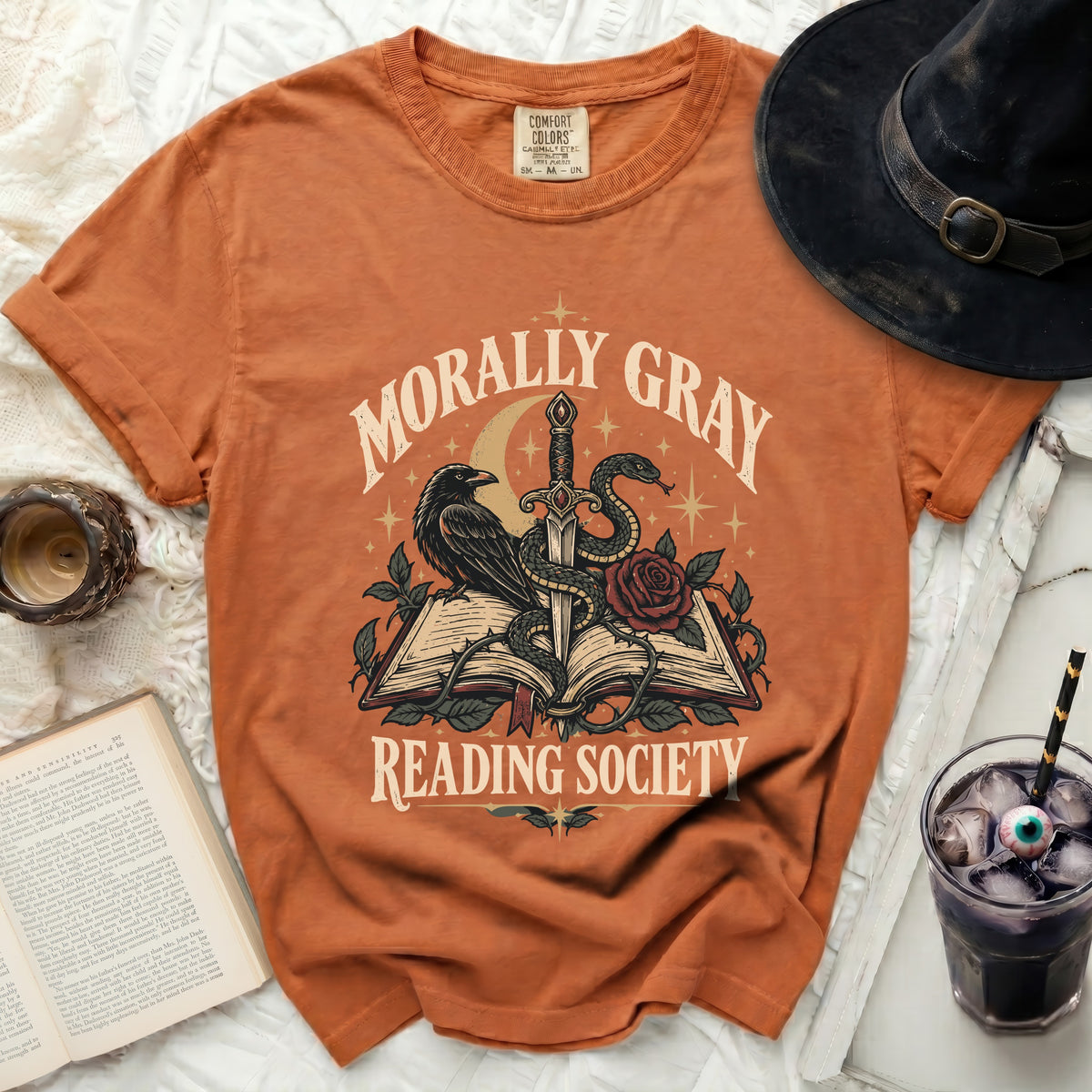 Orange t-shirt with "Morally Gray Reading Society" gothic graphic.