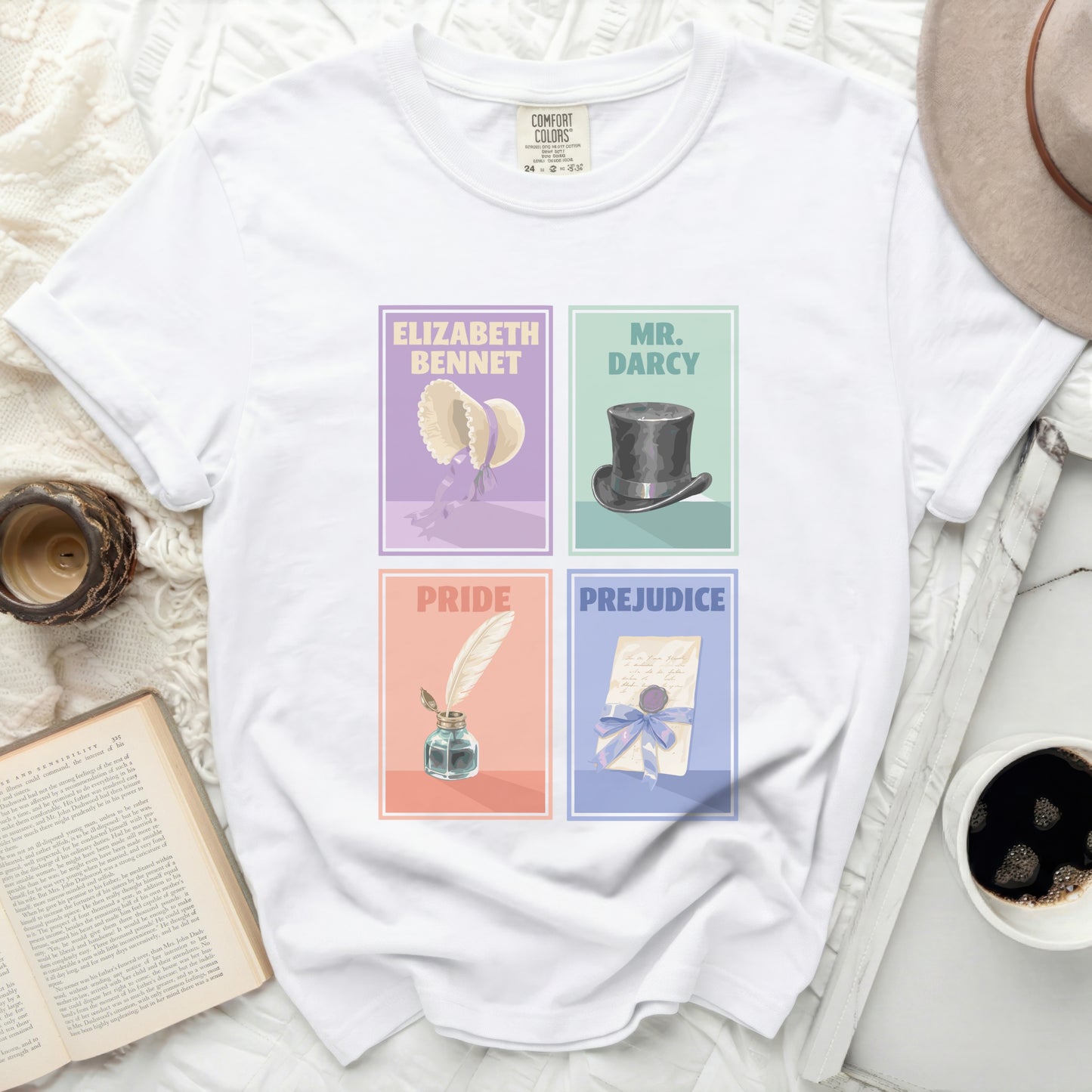 White t-shirt with Pride and Prejudice character art and book elements.