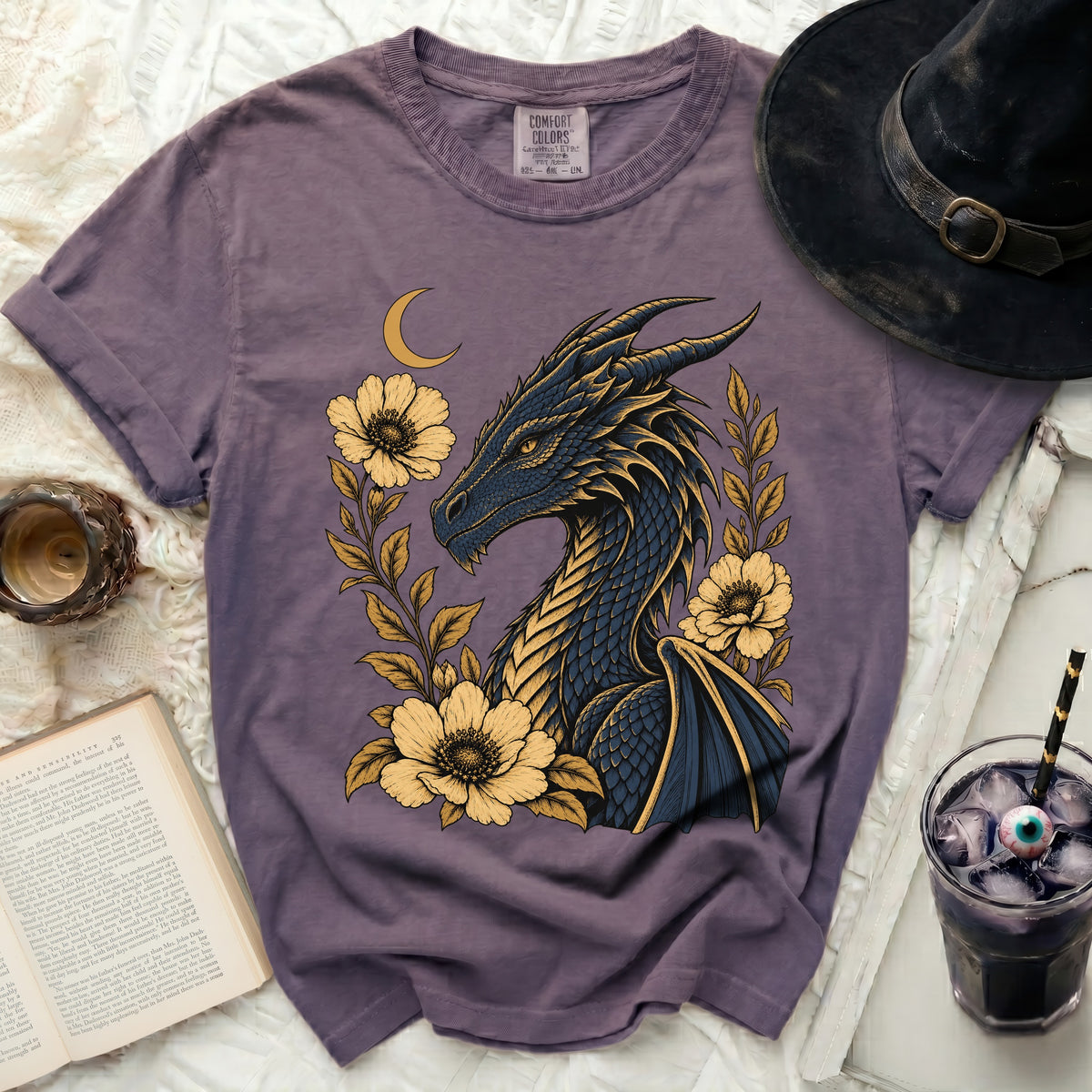 Purple t-shirt featuring a dark blue dragon with yellow flowers and a crescent moon.