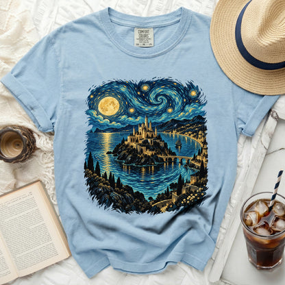 Light blue t-shirt with castle and starry night landscape print.