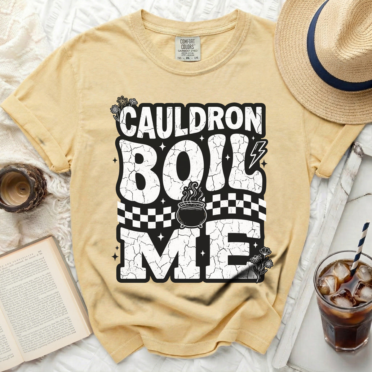 Yellow t-shirt with "Cauldron Boil Me" text and a cauldron graphic.