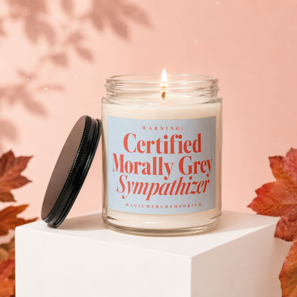 Glass candle with lid and label reading "WARNING: Certified Morally Grey Sympathizer".