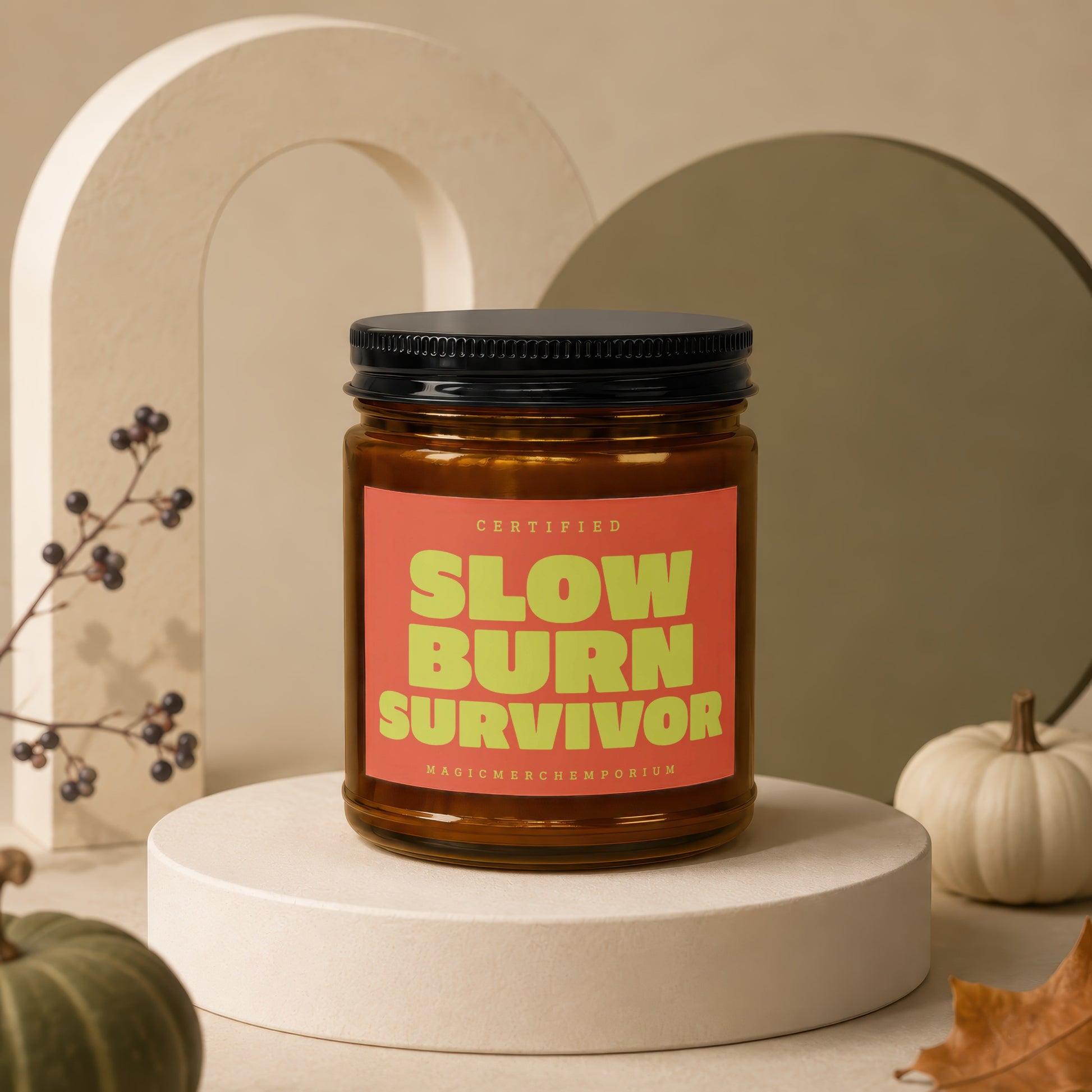 Amber jar candle with label reading "SLOW BURN SURVIVOR".