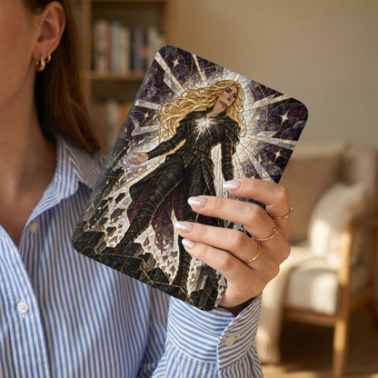 Woman holds a case with a stained-glass-style warrior design.