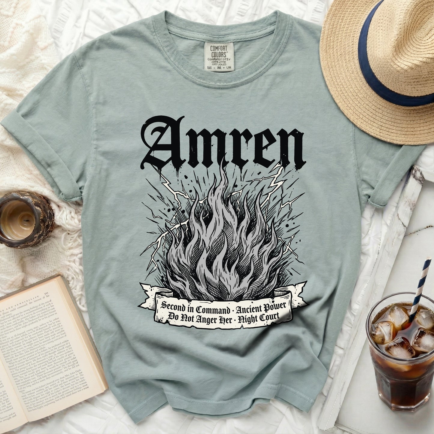 Green t-shirt with "Amren" and a flame graphic.