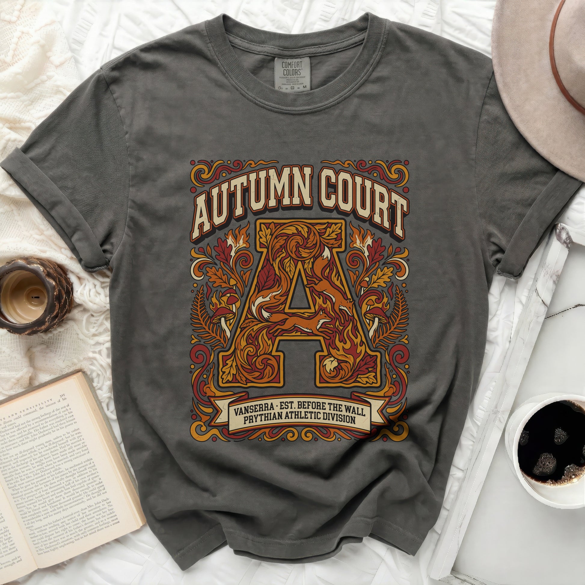 Dark grey t-shirt with "Autumn Court" in decorative lettering and text.