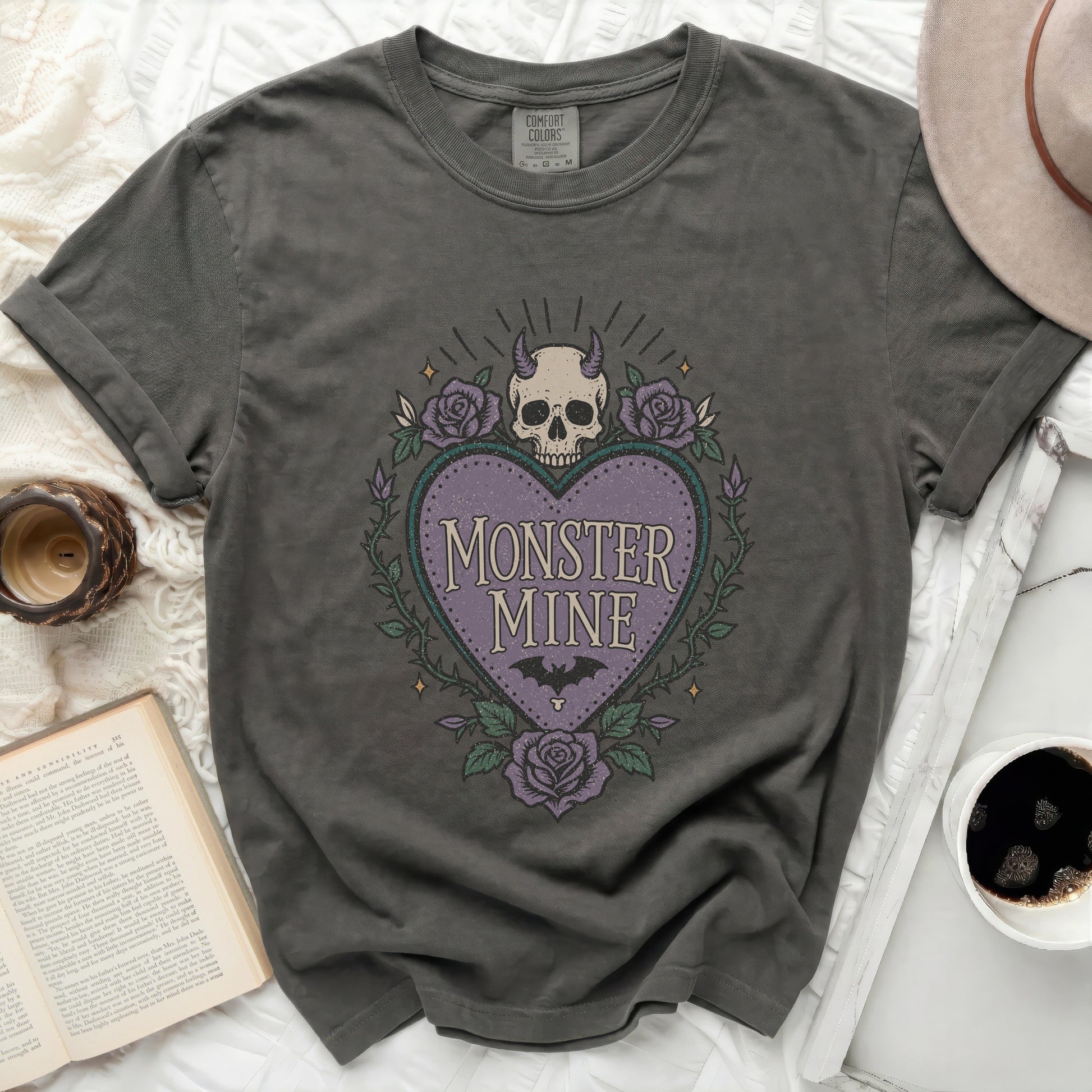 Dark gray t-shirt with "MONSTER MINE" heart and skull graphic.