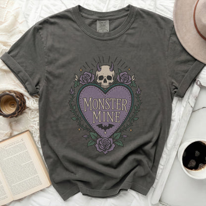 Dark gray t-shirt with "MONSTER MINE" heart and skull graphic.