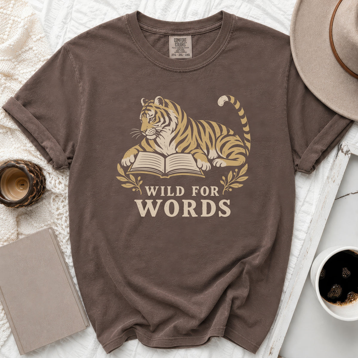 Brown Comfort Colors shirt with tiger and book graphic reading "Wild for Words".