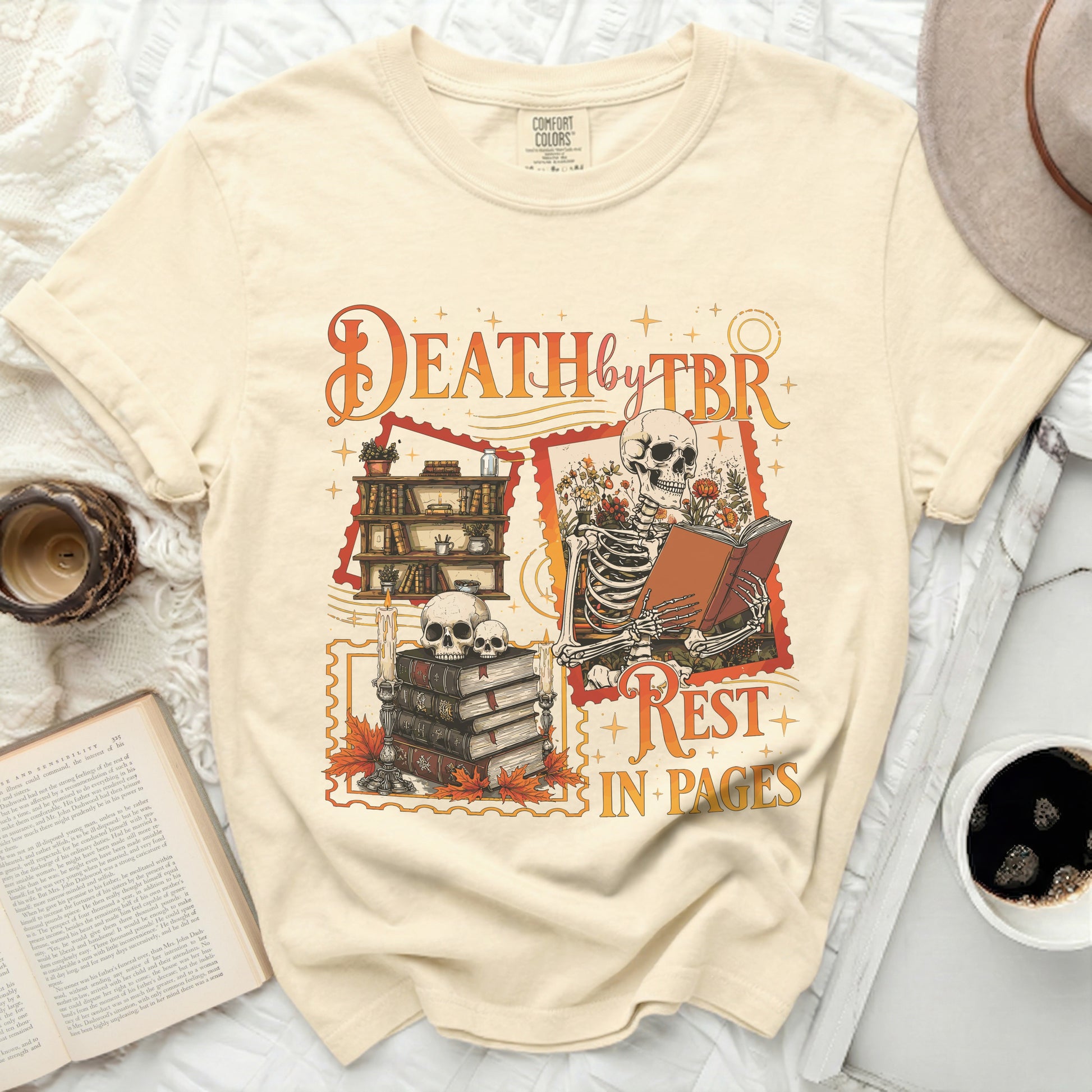 Cream t-shirt with "Death by TBR Rest in Pages" skeleton graphic.