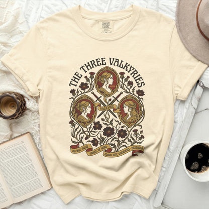 The Three Valkyries graphic on a cream Comfort Colors t-shirt.