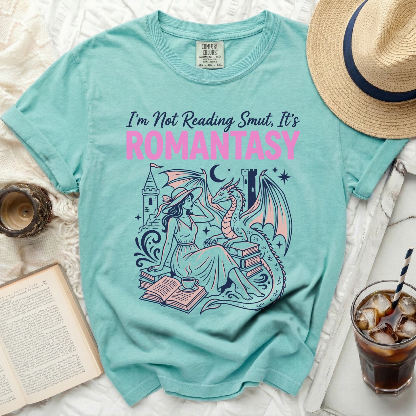 Aqua t-shirt with "I'm Not Reading Smut, It's ROMANTASY" in pink and purple.
