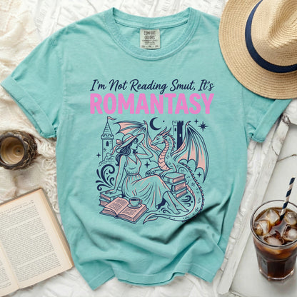 Aqua t-shirt with "I'm Not Reading Smut, It's ROMANTASY" in pink and purple.
