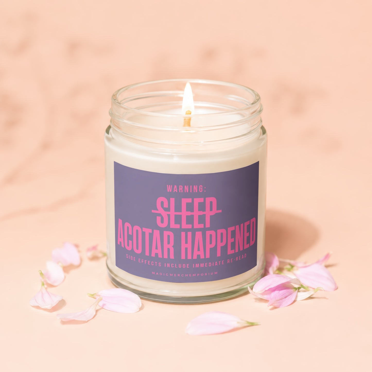 Lit candle with label "WARNING: SLEEP ACOTAR HAPPENED" surrounded by pink petals.