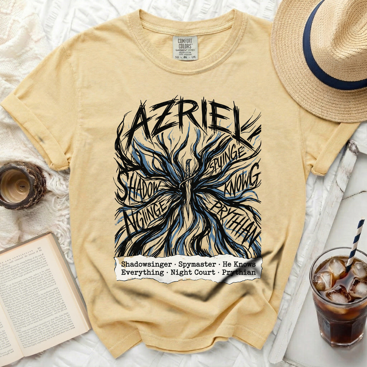 Yellow t-shirt with "AZRIEL" and "Shadowsinger Spymaster He Knows Everything Night Court Prythian" text.