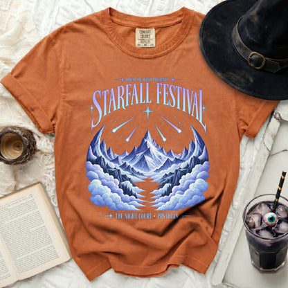 Orange t-shirt with "Starfall Festival" graphic and mountain landscape.