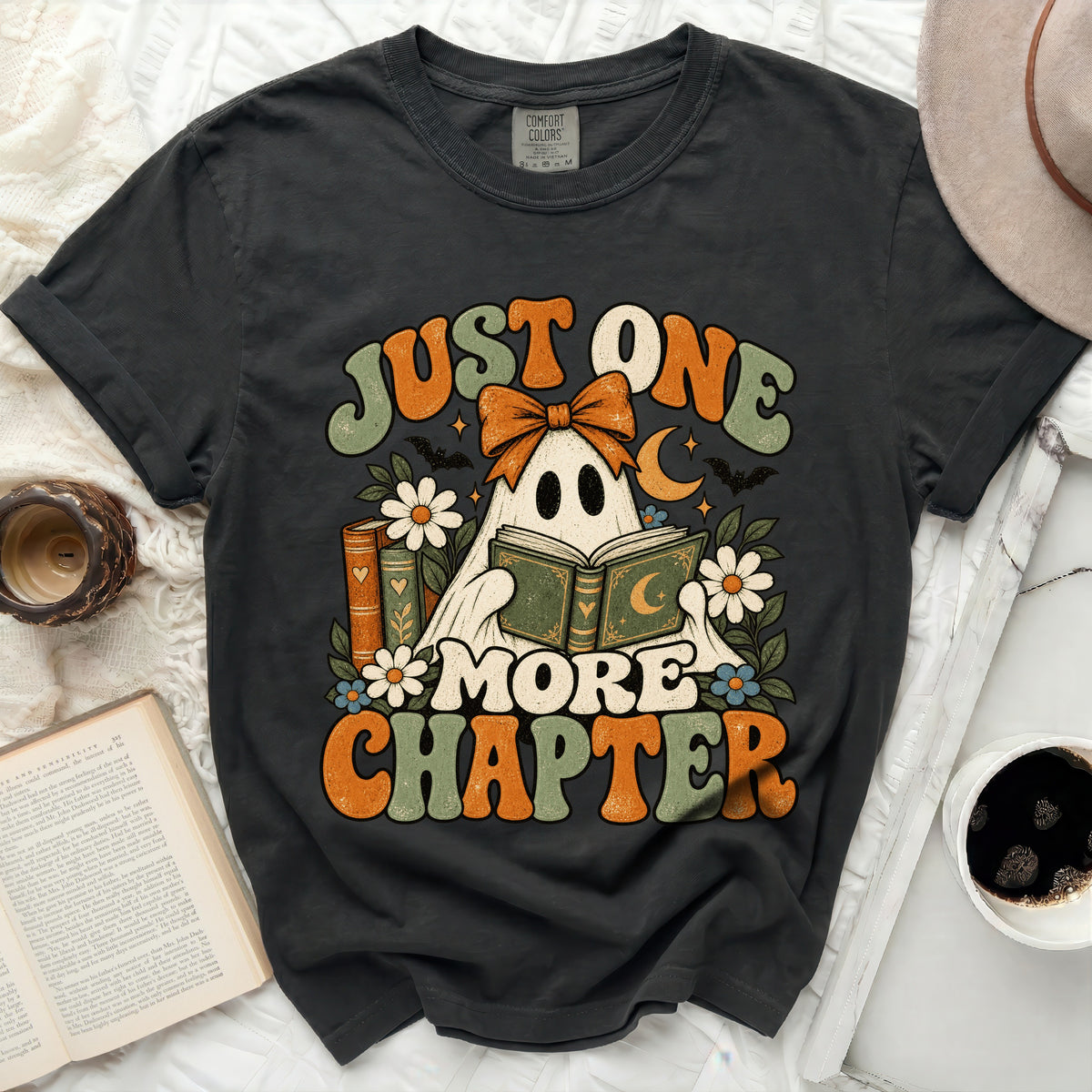 Ghost reading a book with "Just One More Chapter" text.