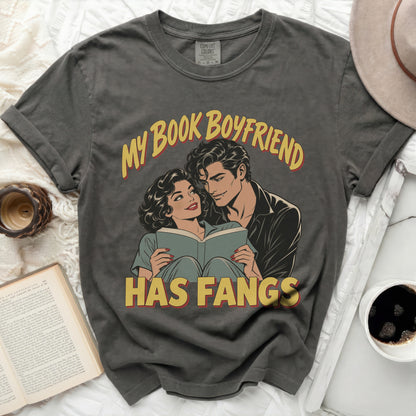 Grey t-shirt with "My Book Boyfriend Has Fangs" text and vintage comic illustration.