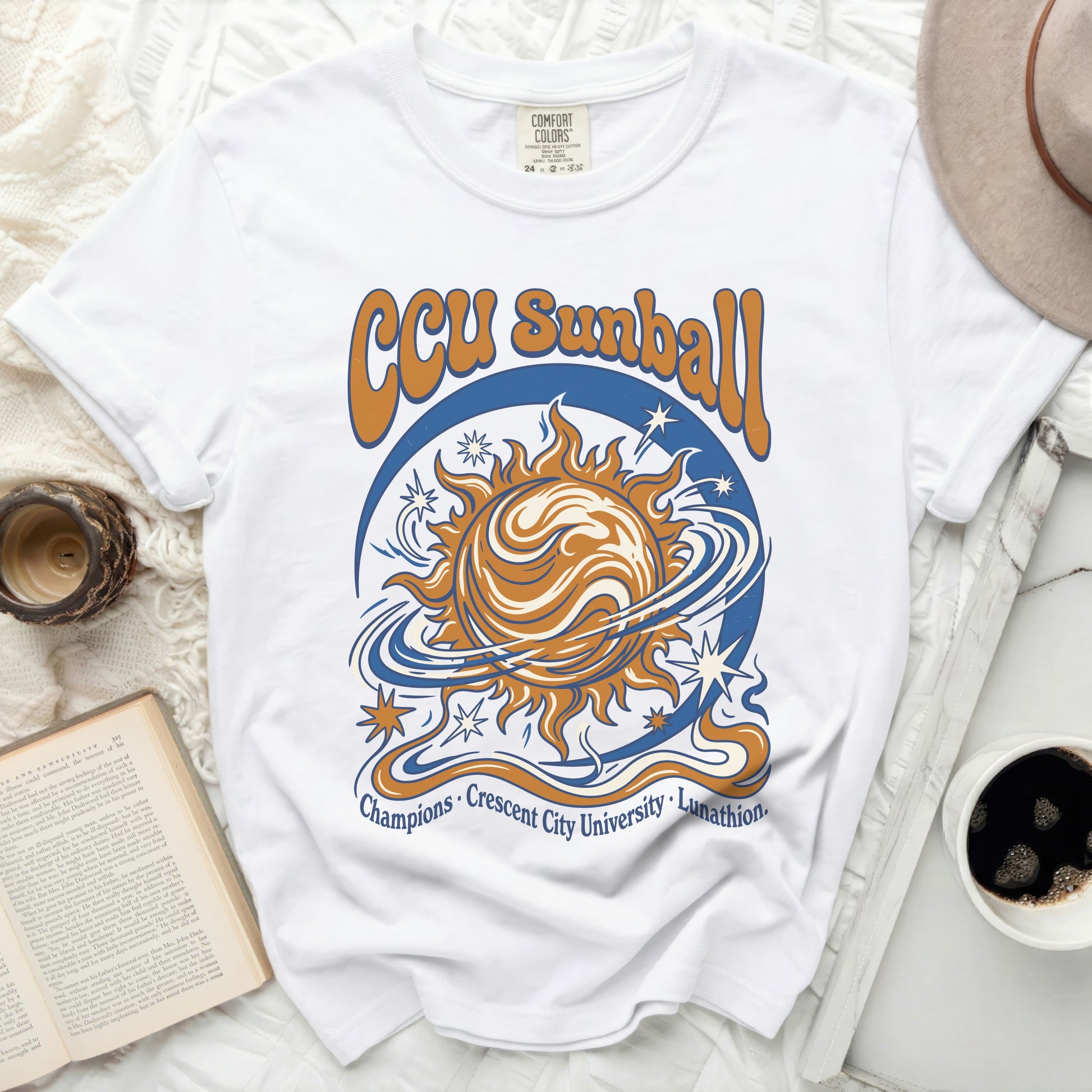 White t-shirt with CCU Sunball graphic and text Champions, Crescent City University, Lunathion.