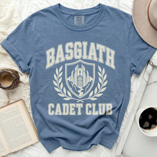 Blue t-shirt with "BASGIATH CADET CLUB" and a crest graphic.