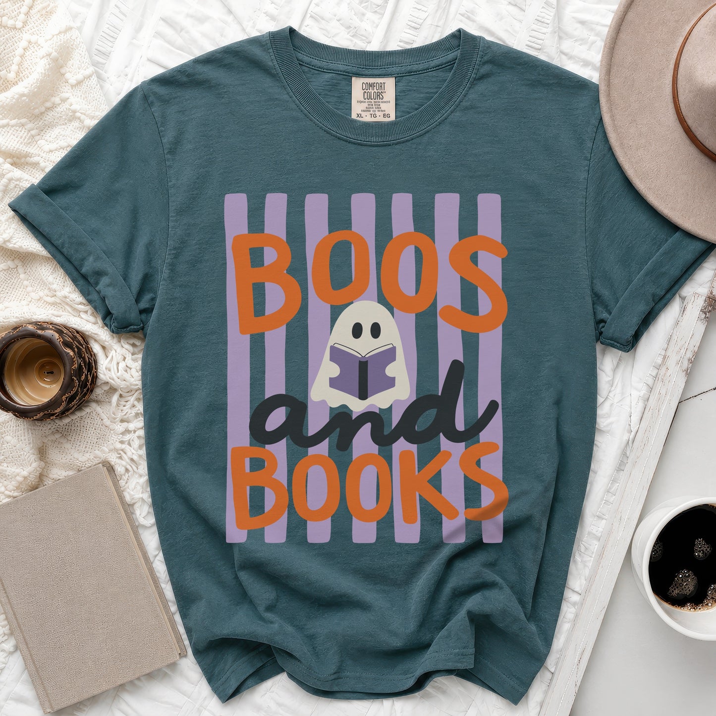 Teal t-shirt with "Boos and Books" and a ghost reading text.