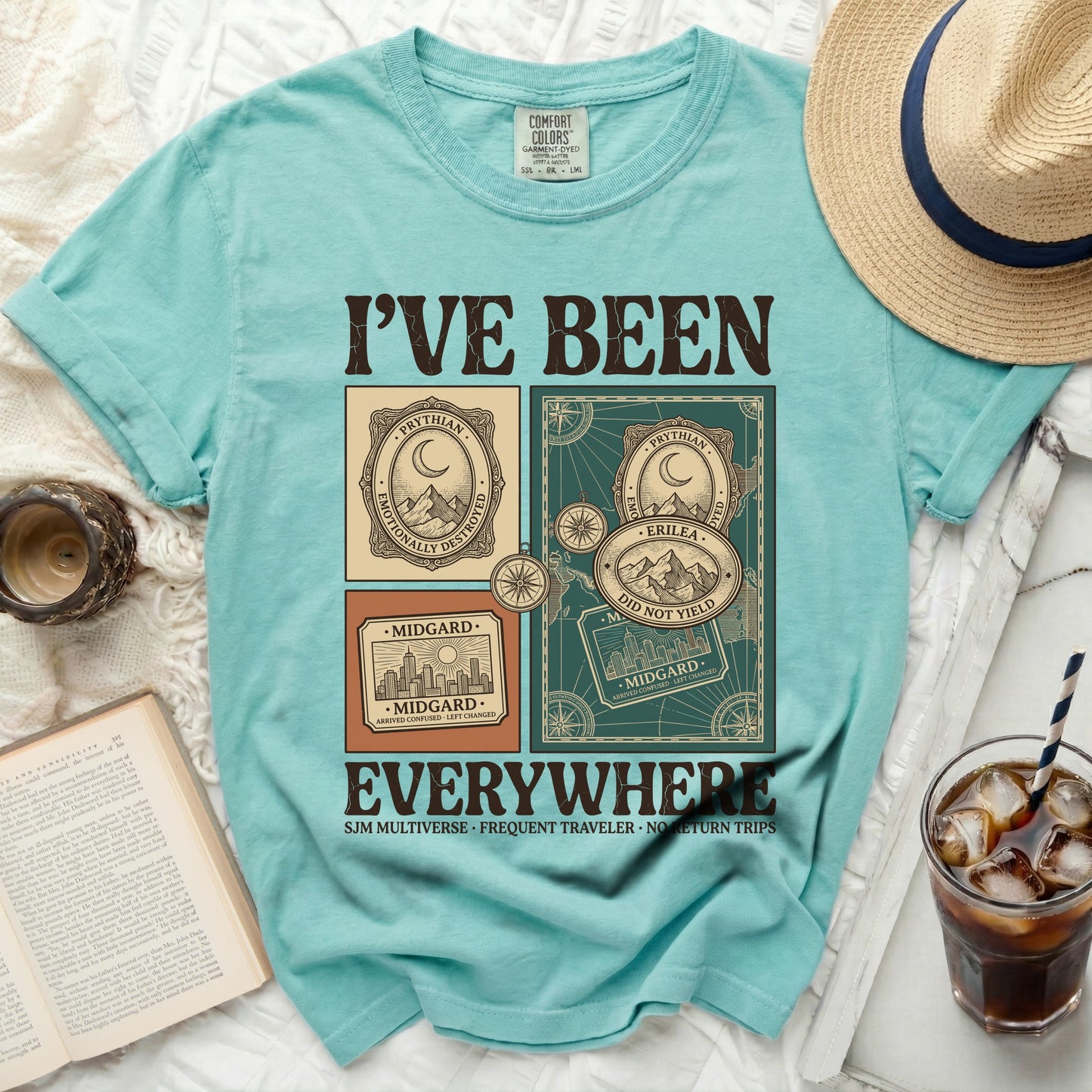Teal t-shirt with "I've Been Everywhere" and travel-themed graphics.