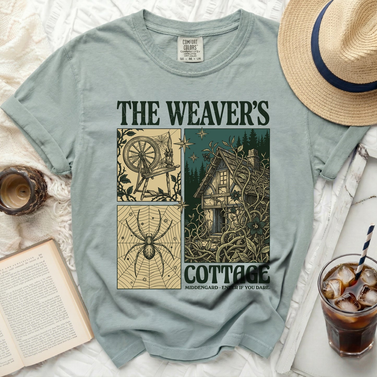 The Weaver's Cottage t-shirt with spider, cottage, and spinning wheel graphics.
