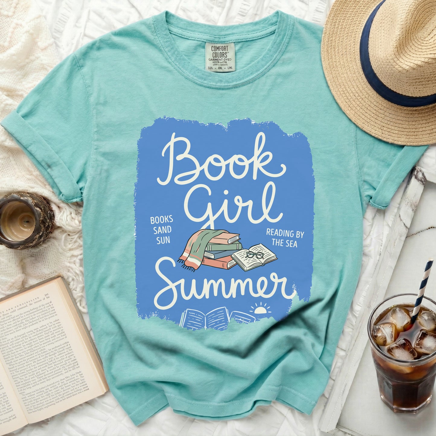 Light blue t-shirt with "Book Girl Summer" graphic and books.