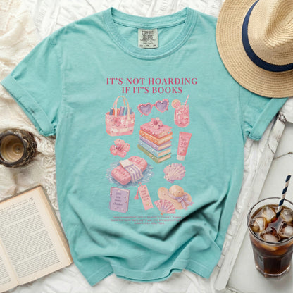 Aqua t-shirt with "It's Not Hoarding If It's Books" and book-themed illustrations.