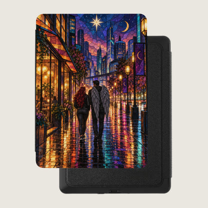 Couple with angel wings walking down a wet city street at night.