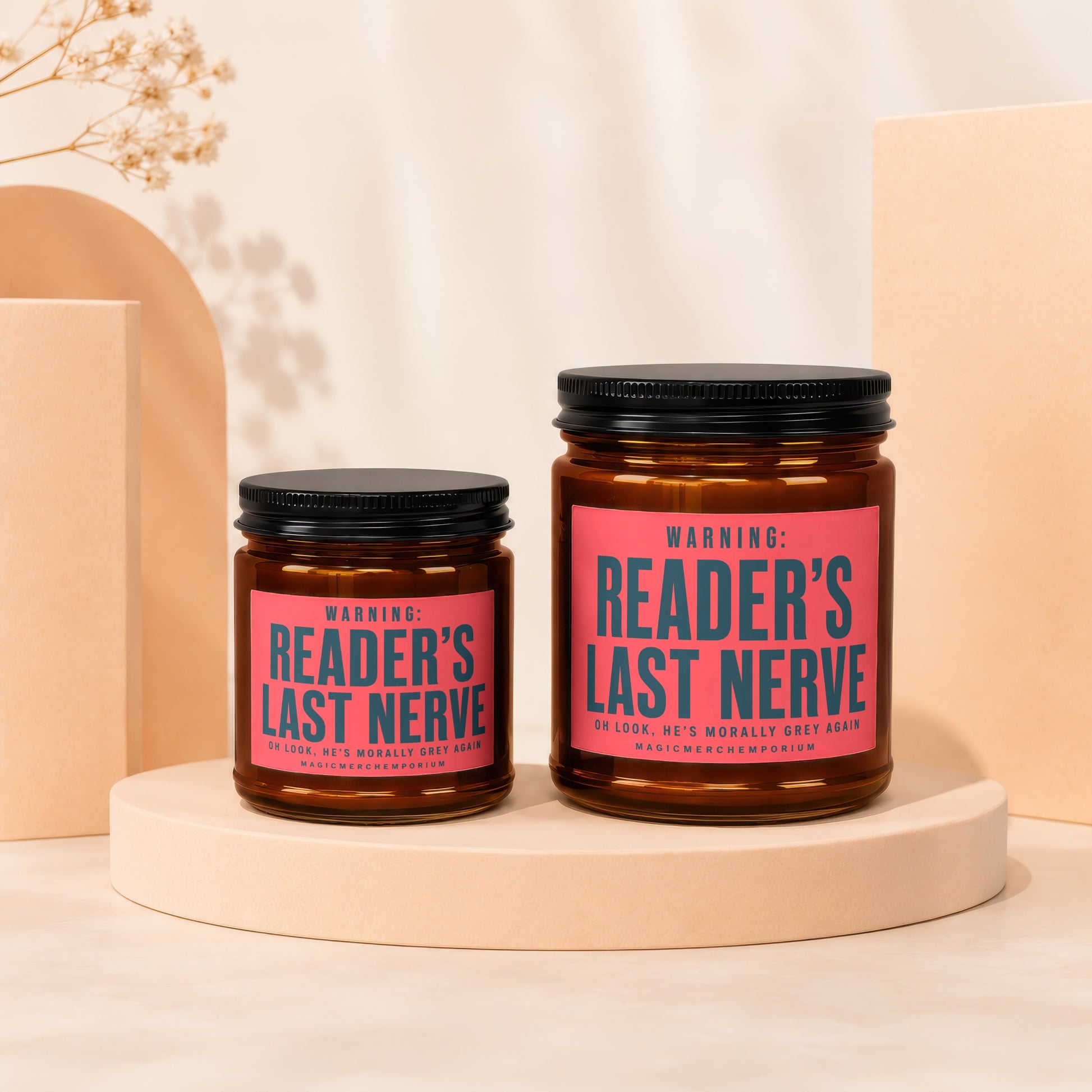 Two amber jars with black lids feature pink labels reading "Reader's Last Nerve."