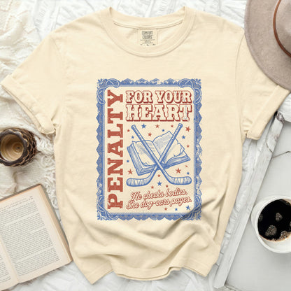 T-shirt with "Penalty" and hockey sticks graphic.