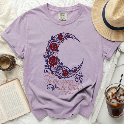 Lavender t-shirt with moon and rose design and text "To the stars who listen".