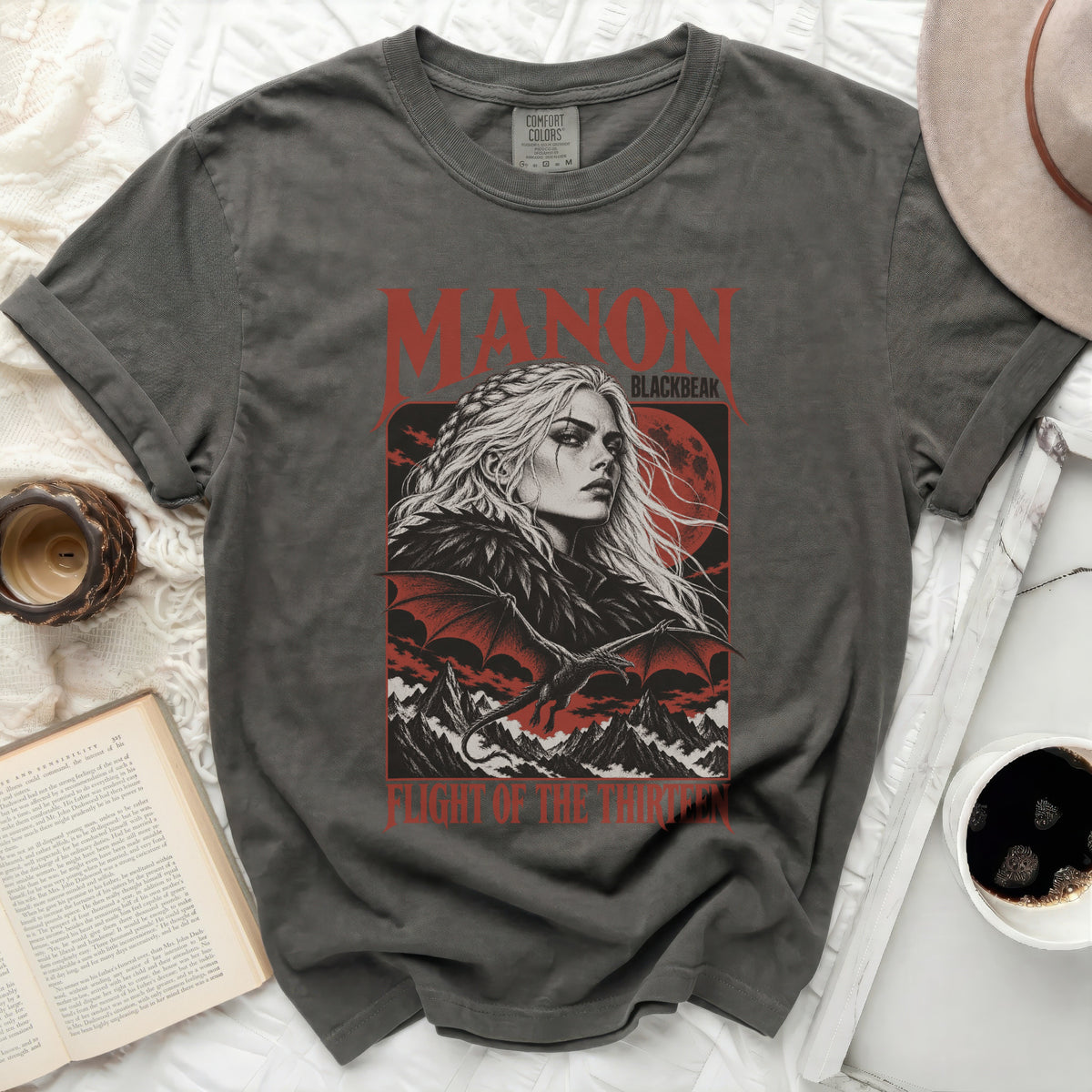Dark gray t-shirt with Manon Blackbeak and dragon graphic, "Flight of the Thirteen" text.