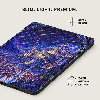 E-reader cover featuring a blue stained-glass castle design, with text indicating a slim, vegan leather build.