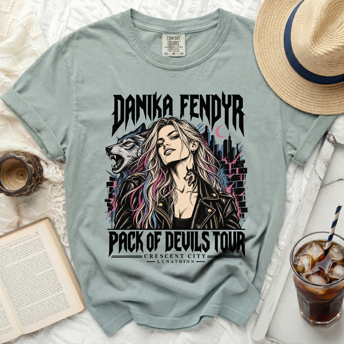 Danika Fendyr Pack of Devils Tour graphic tee with wolf and city design.