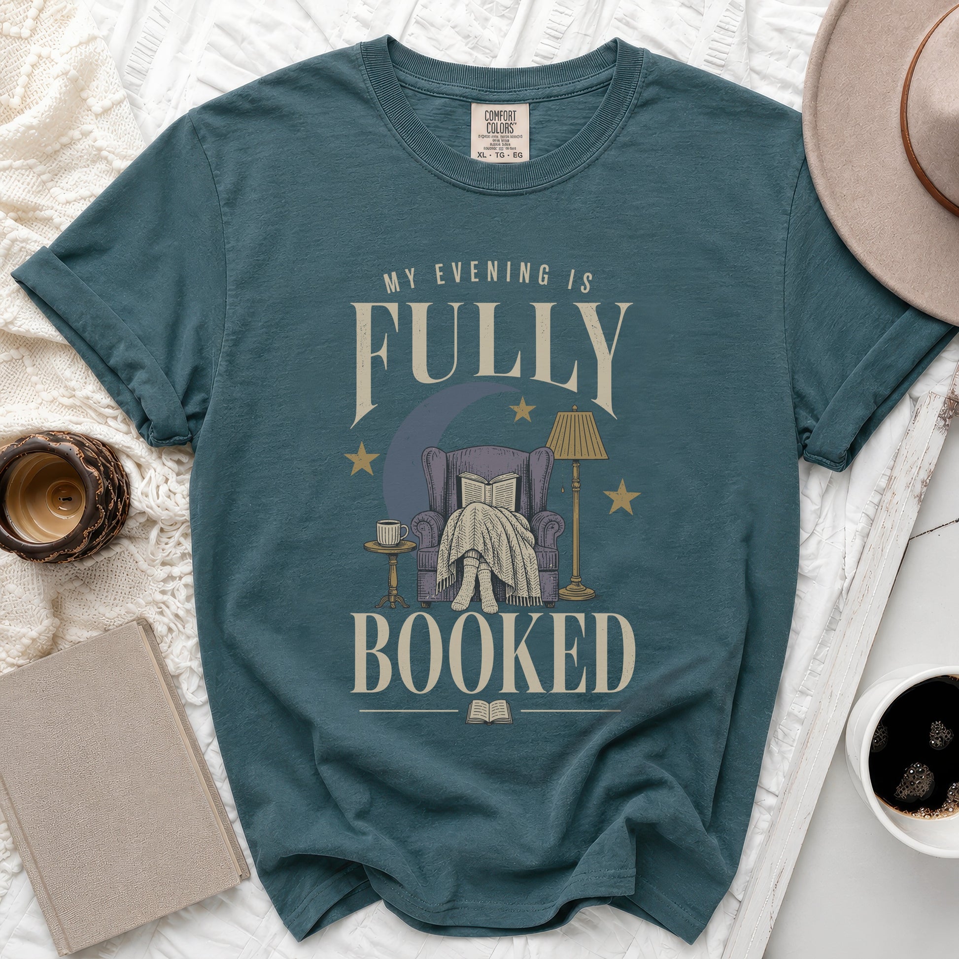 T-shirt with "My Evening Is Fully Booked" text and reading graphic.