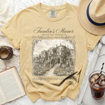 Yellow t-shirt with "Tamlin's Manor High Lord's Estate" graphic.