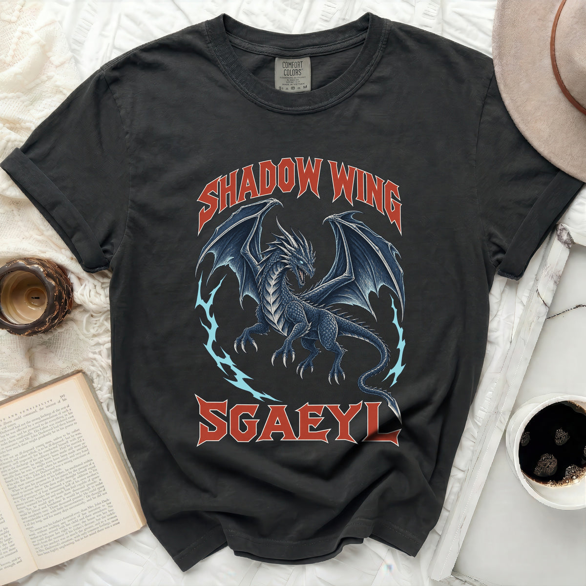 Dark t-shirt with a blue dragon graphic and text "SHADOW WING SGAEYL".