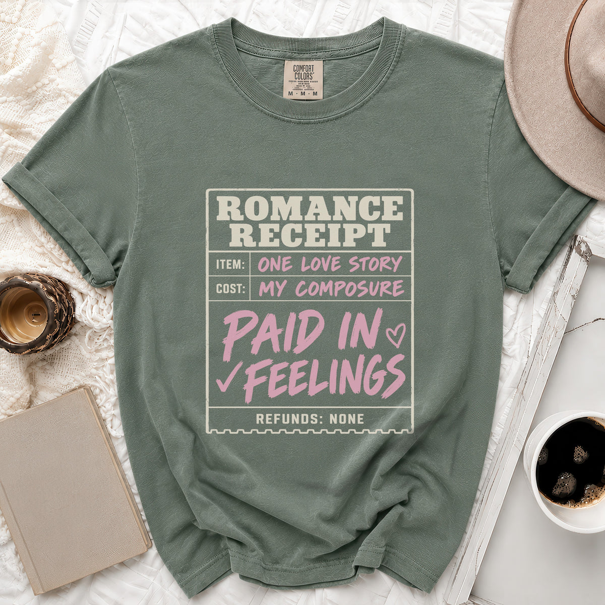 Green t-shirt with "Romance Receipt" graphic about love and feelings.