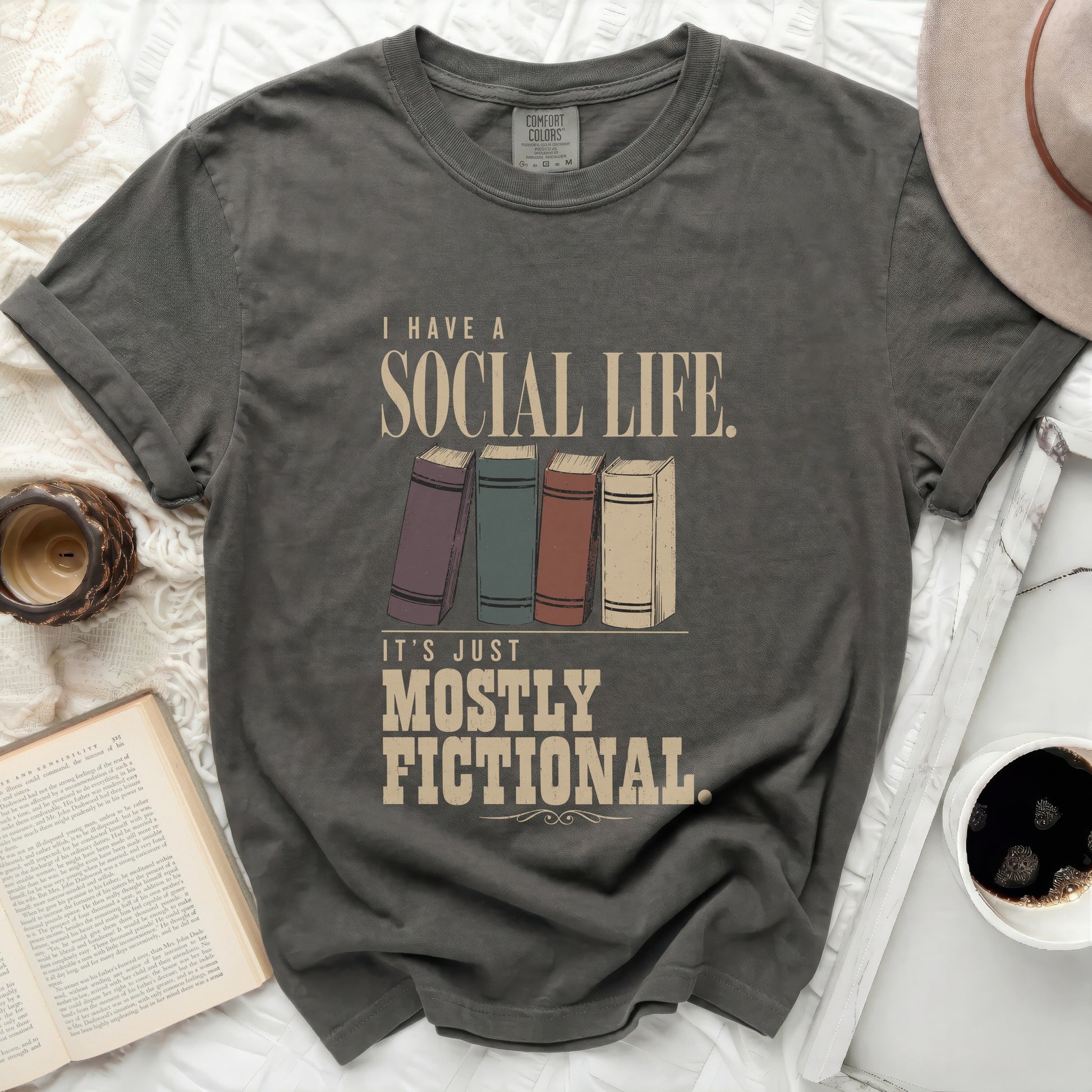 Dark grey t-shirt with "I Have a Social Life. It's Just Mostly Fictional" text.