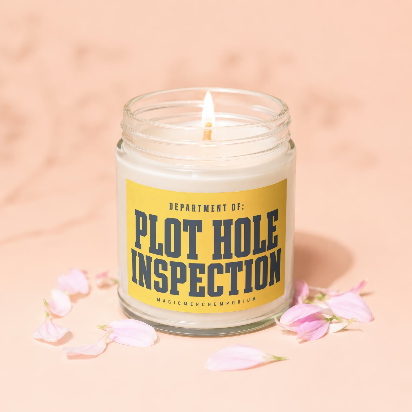 Glass jar candle with a yellow label reading "DEPARTMENT OF: PLOT HOLE INSPECTION".