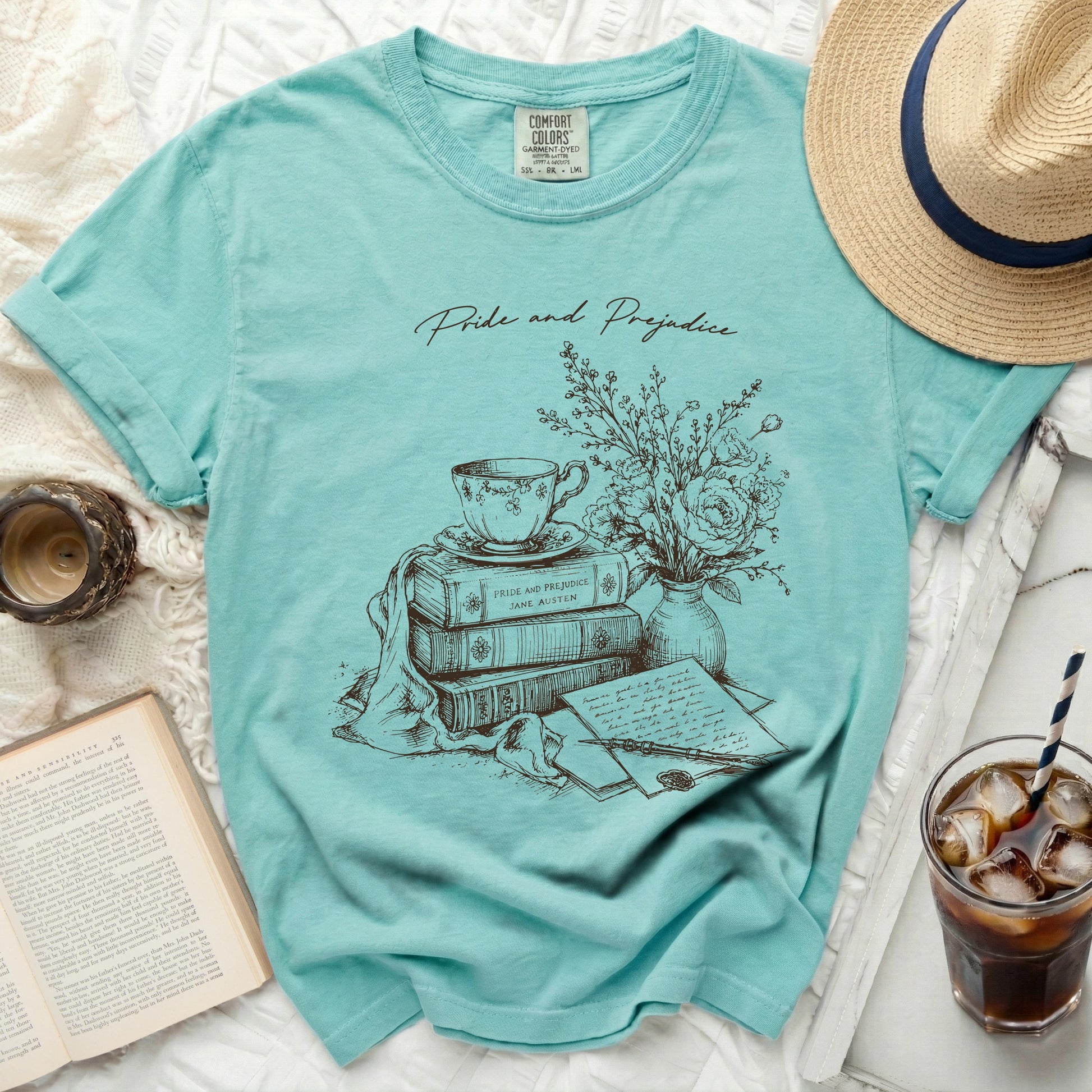 Teal t-shirt with Jane Austen's Pride and Prejudice illustration.