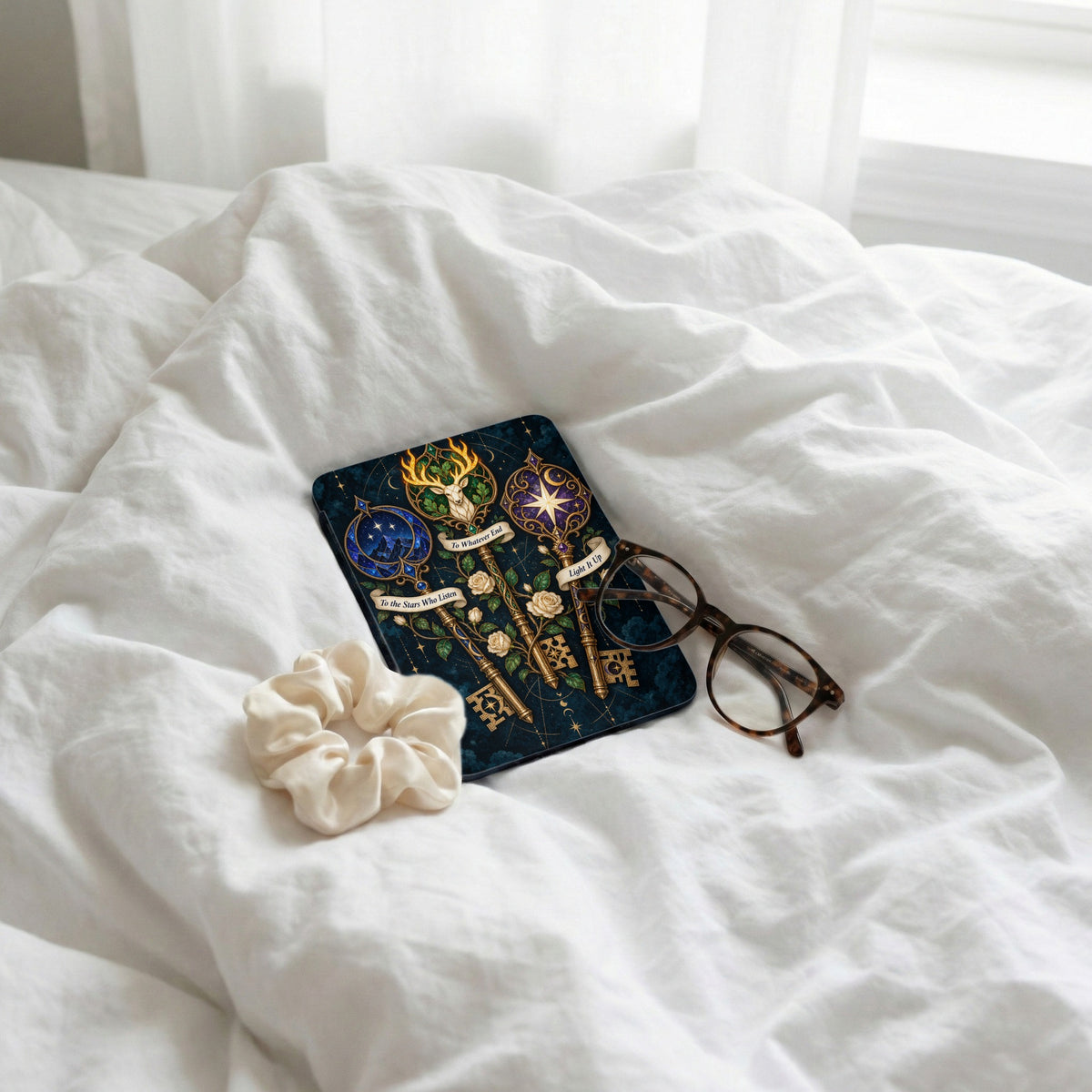 Faux leather journal with ornate keys, deer, roses, and celestial text.