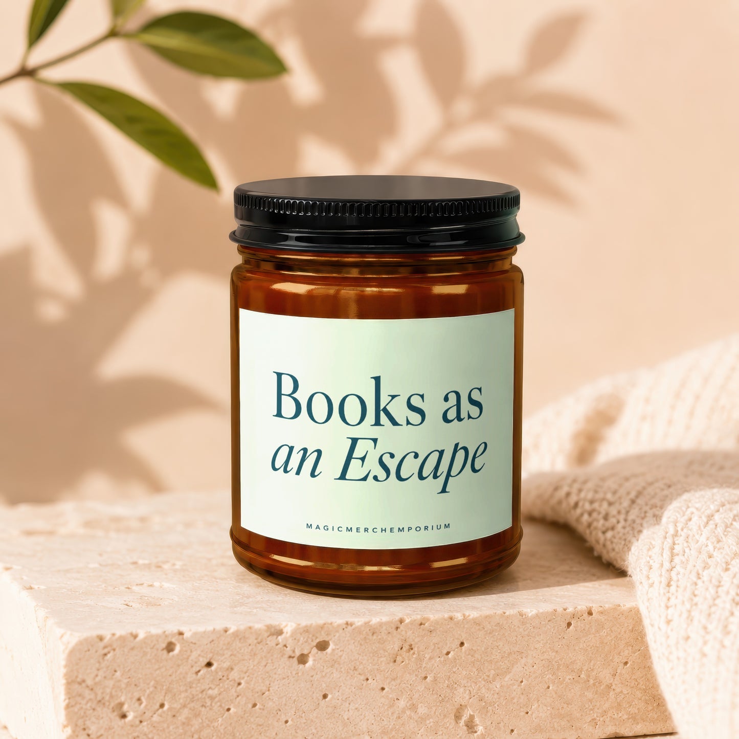 Brown glass candle with cream label reading "Books as an Escape".