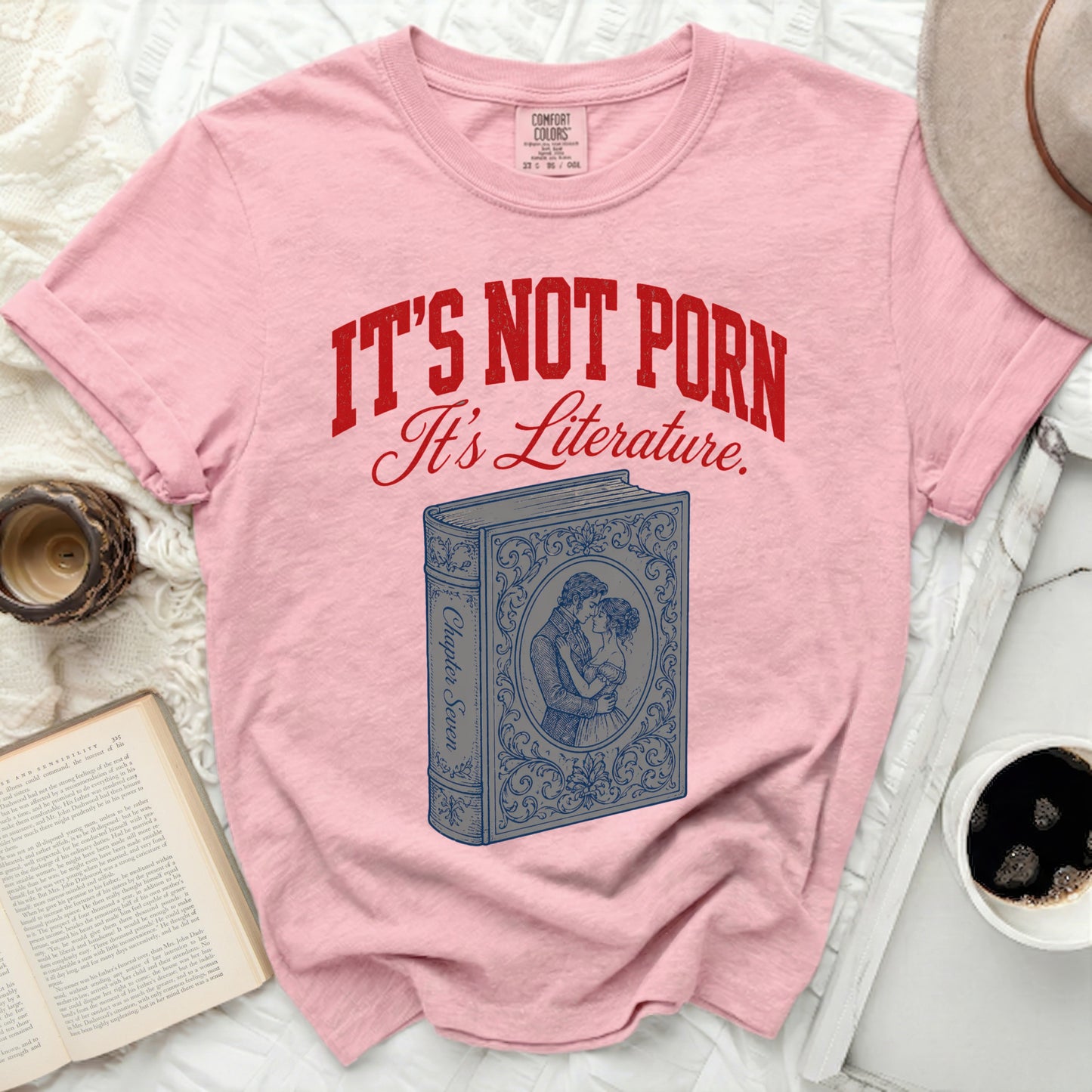 Pink t-shirt with "It's Not Porn. It's Literature." and book illustration.
