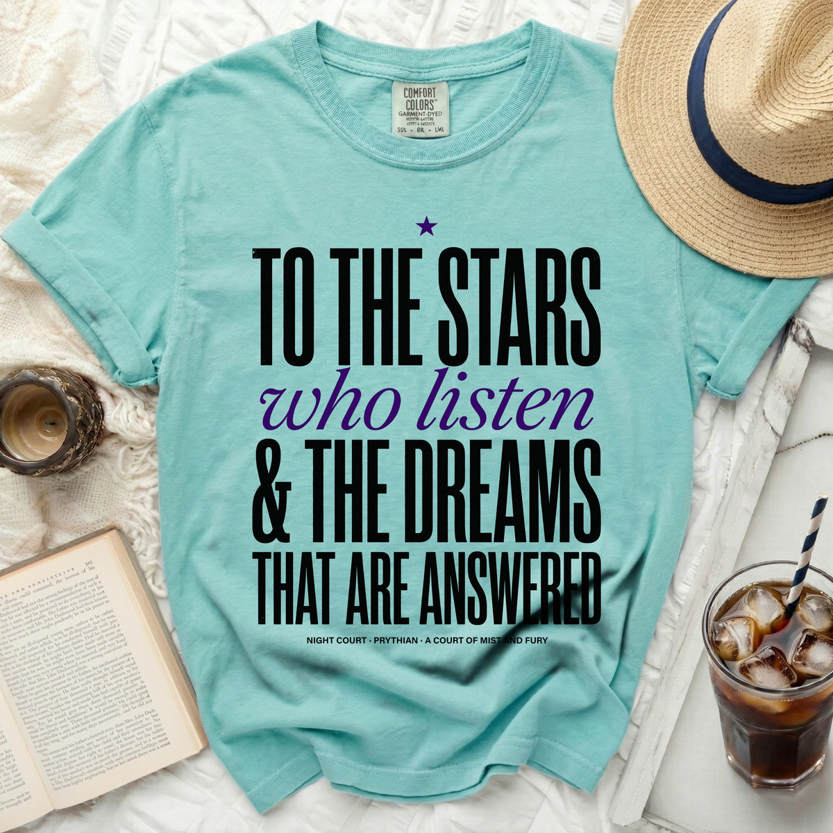 Teal t-shirt with black and purple text "To the Stars Who Listen & The Dreams That Are Answered".