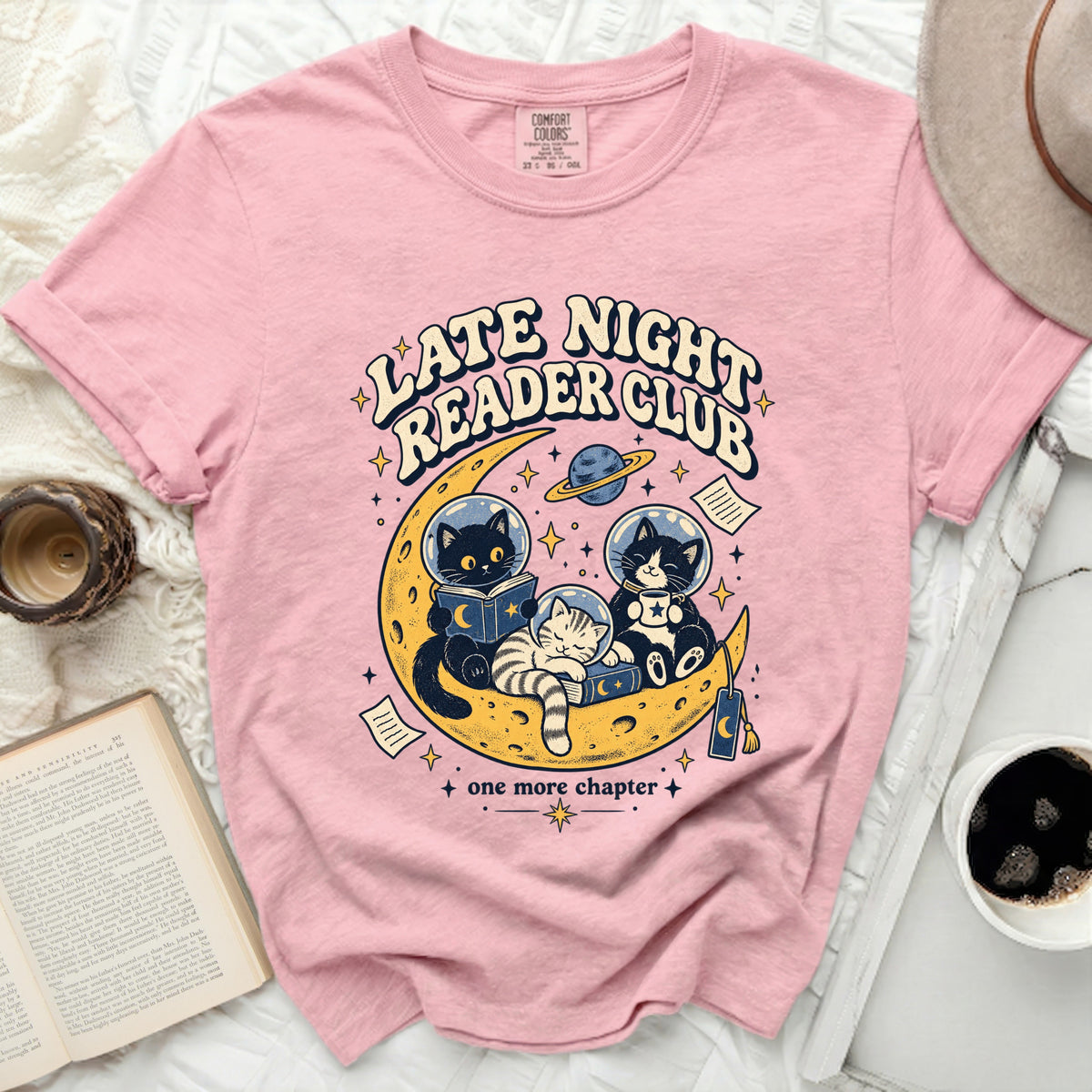Pink t-shirt with "Late Night Reader Club" and cats reading on the moon.